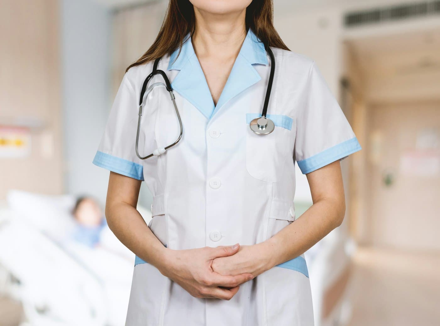 Healthcare professional in uniform with a stethoscope